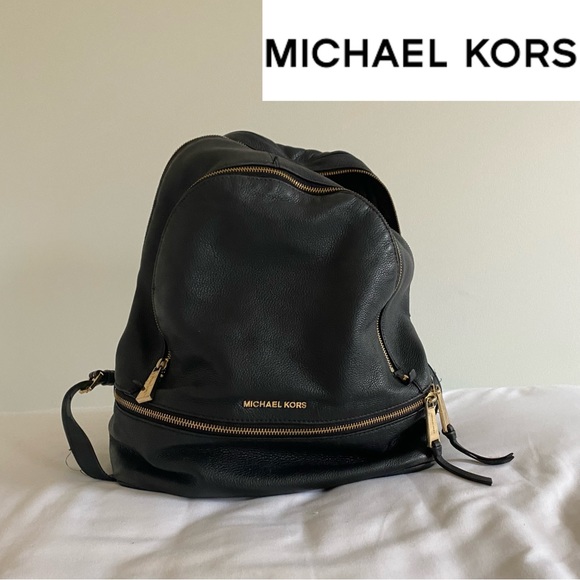 Michael Kors Handbags - AUTHENTIC michael kors backpack leather 💫 DISCONTINUED